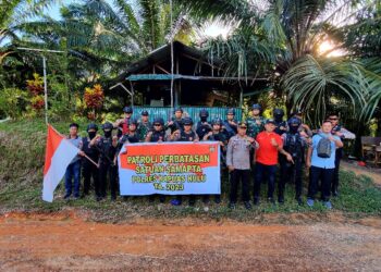 Wujud Sinergitas TNI-Polri, Satgas Pamtas Yonarmed 19/105 Trk Bogani Patroli Bersama Polri Di Perbatasan RI-Malaysia