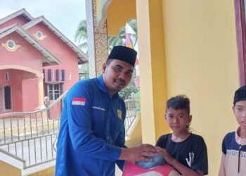 Menyambut Hari Raya Aidil Fitri 1444 H, PK KNPI Kecamatan Wampu Berbagi dengan Anak Yatim Piatu