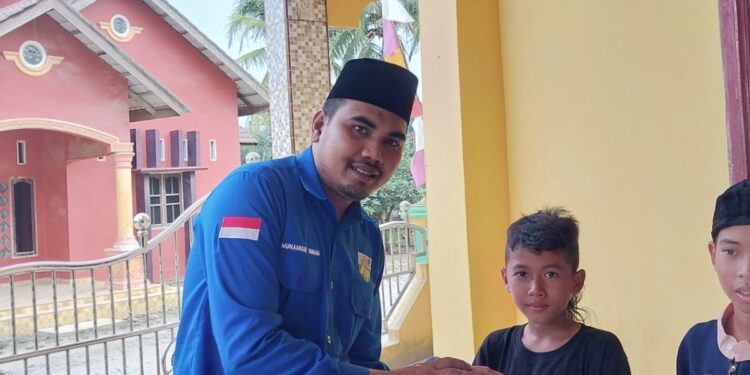 Menyambut Hari Raya Aidil Fitri 1444 H, PK KNPI Kecamatan Wampu Berbagi dengan Anak Yatim Piatu
