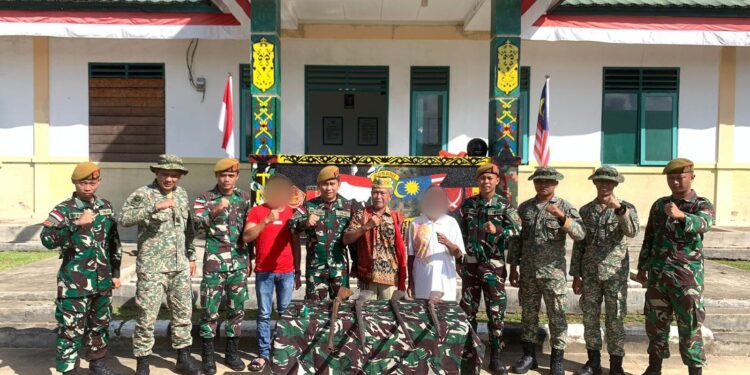 Jelang Purna Tugas, Satgas Yonarmed 19/105 Trk Bogani Terima 6 Pucuk Senpi Rakitan Dan 2 Munisi Dari Masyarakat Secara Sukarela.