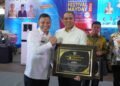 Pj Bupati Langkat Faisal Hasrimy terima Paritrana Award 2024